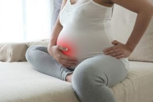 Беременность болит живот в районе пупка