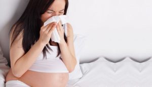 При беременности чихать больно