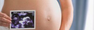 18 недель беременности каменеет живот